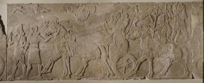 上图:宁录亚述王宫出土的亚述那西尔帕二世(Ashurnasirpal II,主前883-859年在位)的浮雕,现存于大英博物馆。浮雕上描绘亚述王凯旋归来,鹰神在天上一路护佑。